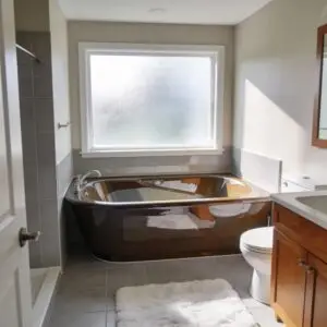 Stylish reglazed bathtub in a modern New Jersey bathroom showcasing quality bath renovation